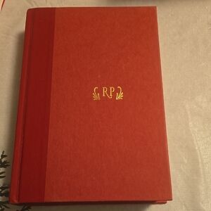 Red Hardcover Book with Gold Initials